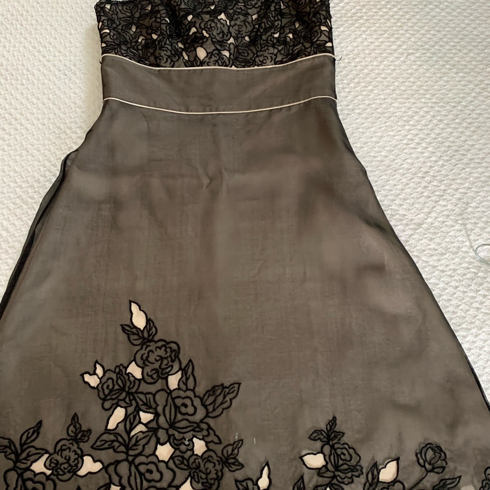 Strapless dress with gorgeous fabric and cut outs.